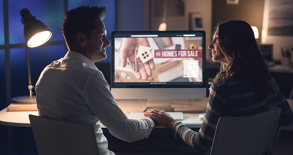 Image of couple looking a virtual sales tools