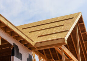 Developing new house. Roof structure with wooden shingles.